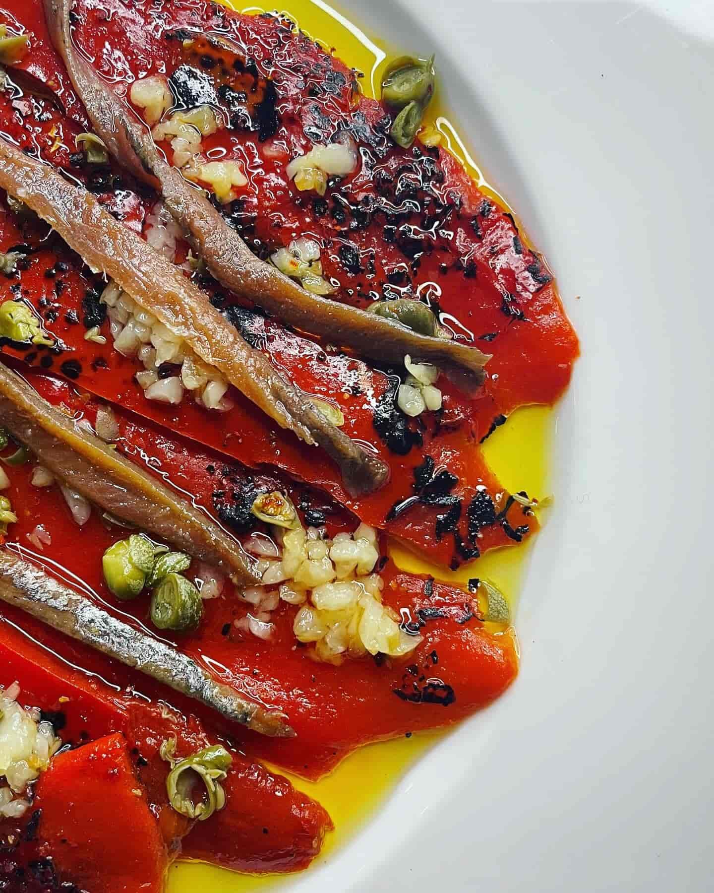 A Close Up of a Plate of Food With Anchovies and Peppers — Onesta Cucina in Bowral, NSW