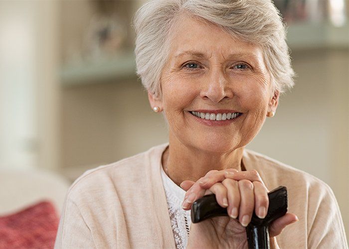 Elderly Woman Smiling at Home — Lancaster, CA — Lancaster Advanced Dental