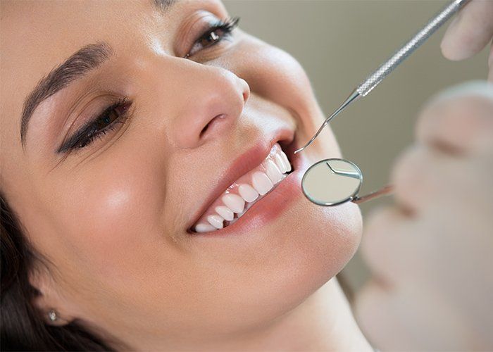 Young Woman Baring Her Teeth — Lancaster, CA — Lancaster Advanced Dental