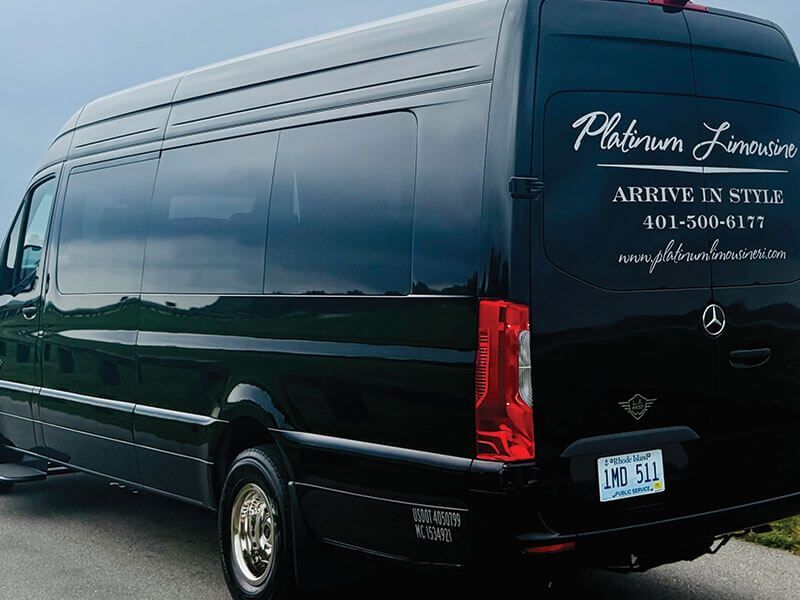 A black Mercedes-Benz limousine van with 