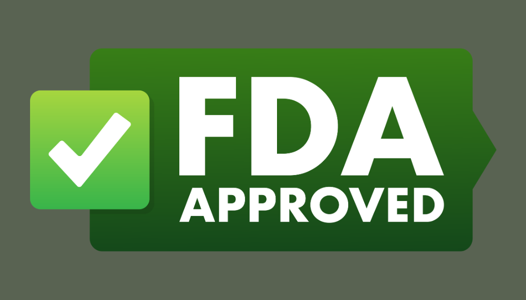 A green fda approved logo with a check mark on it for iv drip approval for urbanrx health lounge in houston, tx