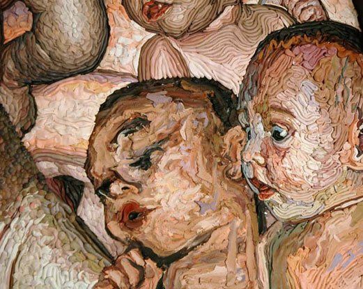 Close up on a group of baby's faces.