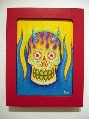 A colorful painting of a skull with horns and flames.