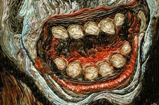 A close up of a painting of a clown 's mouth with lots of teeth.