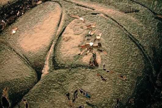 A close up of a person's backside with leaves on it.