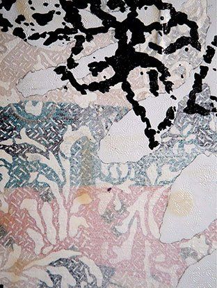 A close up of a painting with a black and white pattern