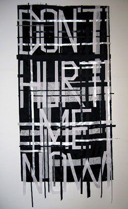 A black and white painting that says