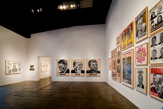 A large room with a lot of pictures on the wall