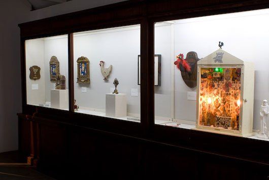 A display case with a lot of objects in it