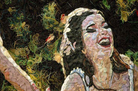 A close up of a painting of a woman laughing.