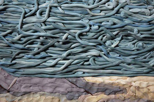 A close up of a painting of noodles on a table.