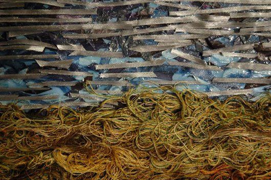 A close up of a pile of yarn on a table.