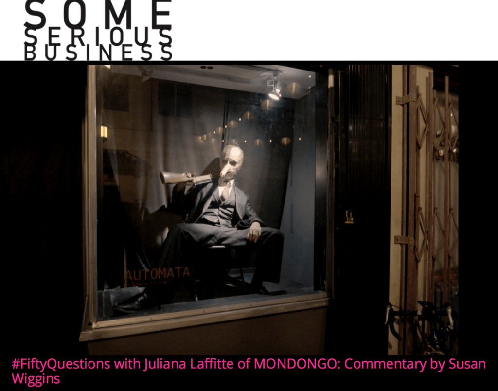 A man is sitting in a chair in a window.