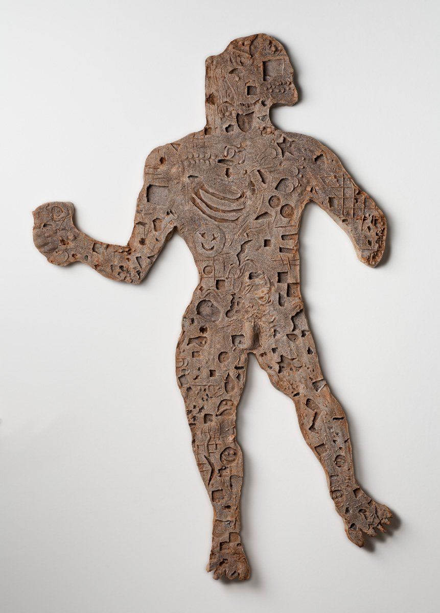 A silhouette of a man with a fist in the air