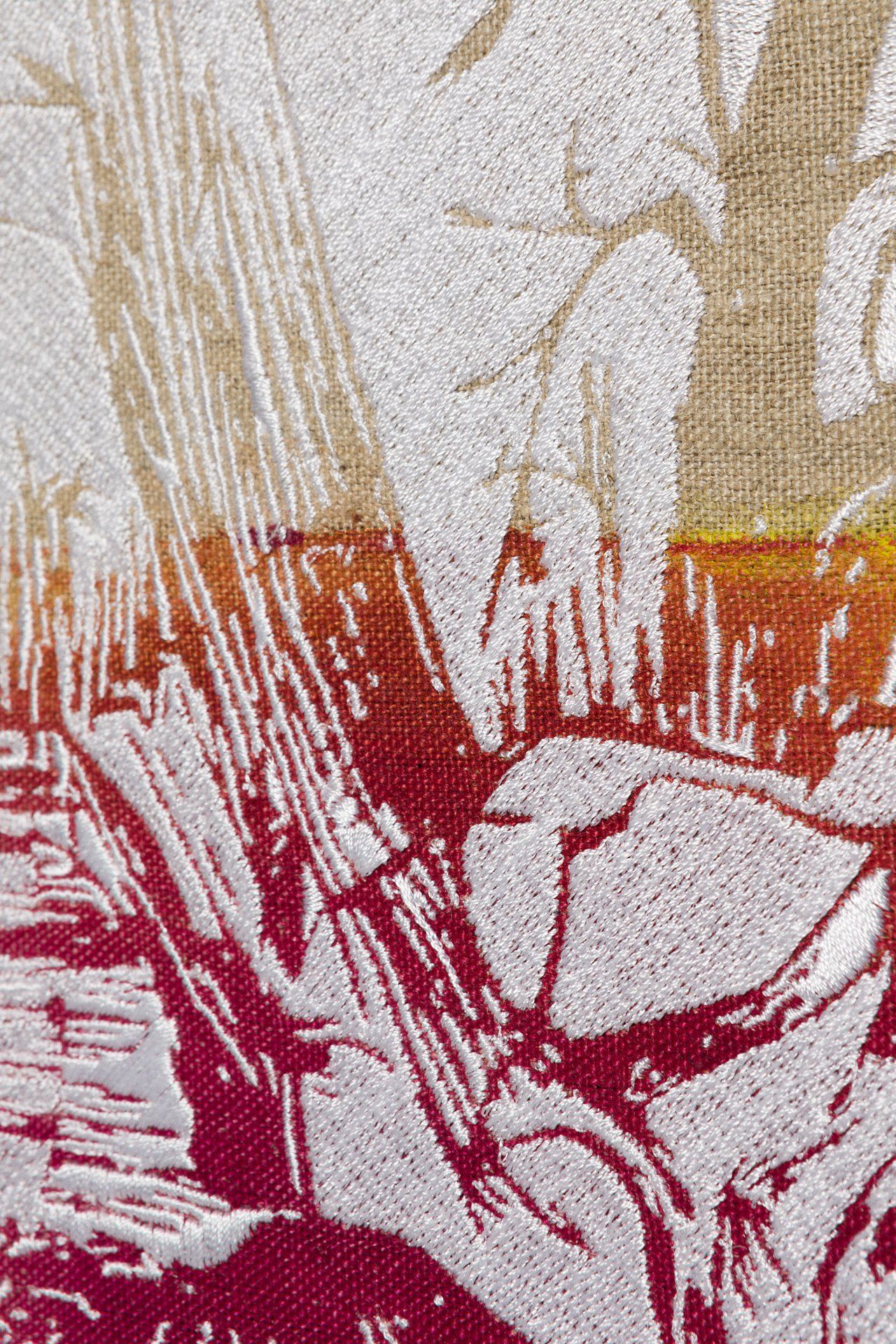 A close up of a painting of a person sitting on a rock.