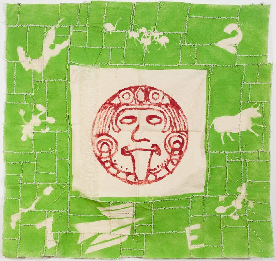 A green and white square with a face and the letter e on it