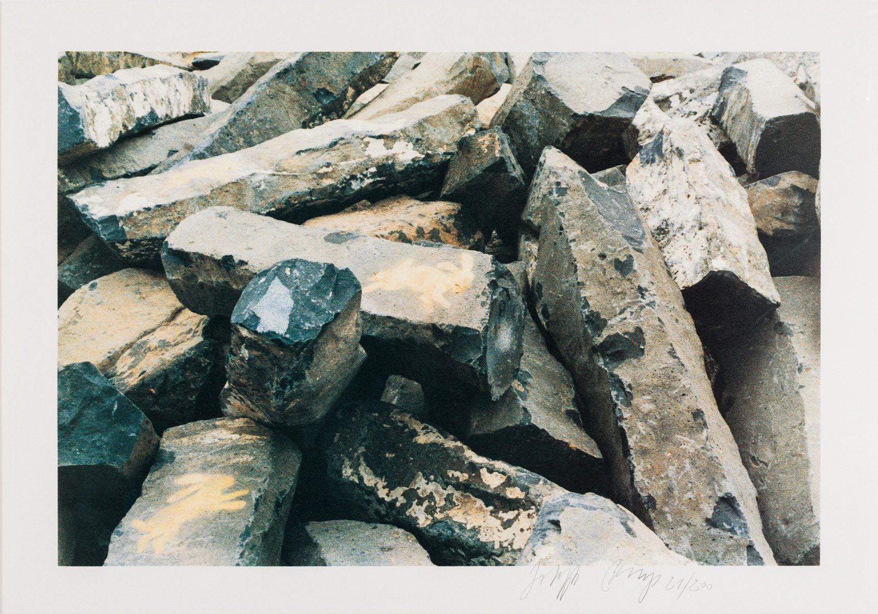 A pile of rocks with a white frame around them