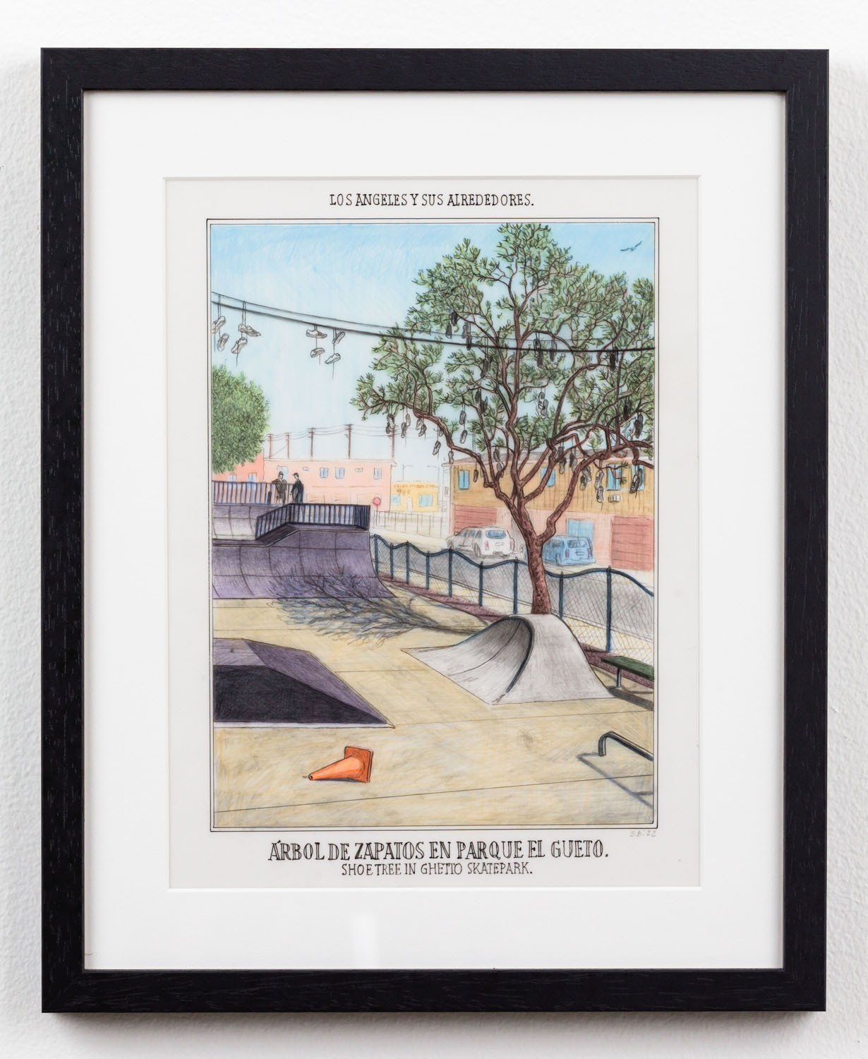A framed painting of a tree and a shoe on the ground.