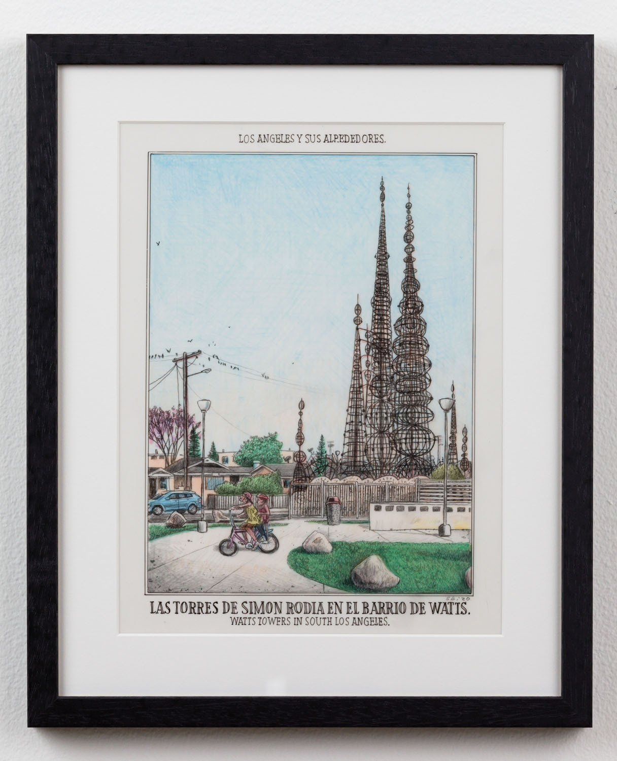 A framed picture of a man riding a bike