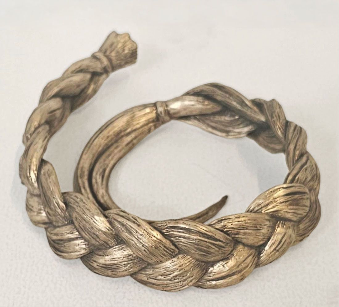 Painting of a woman with five eyes blending with an image of a ballroom.