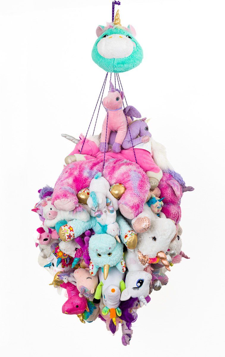 A bunch of stuffed animals are hanging from a string.