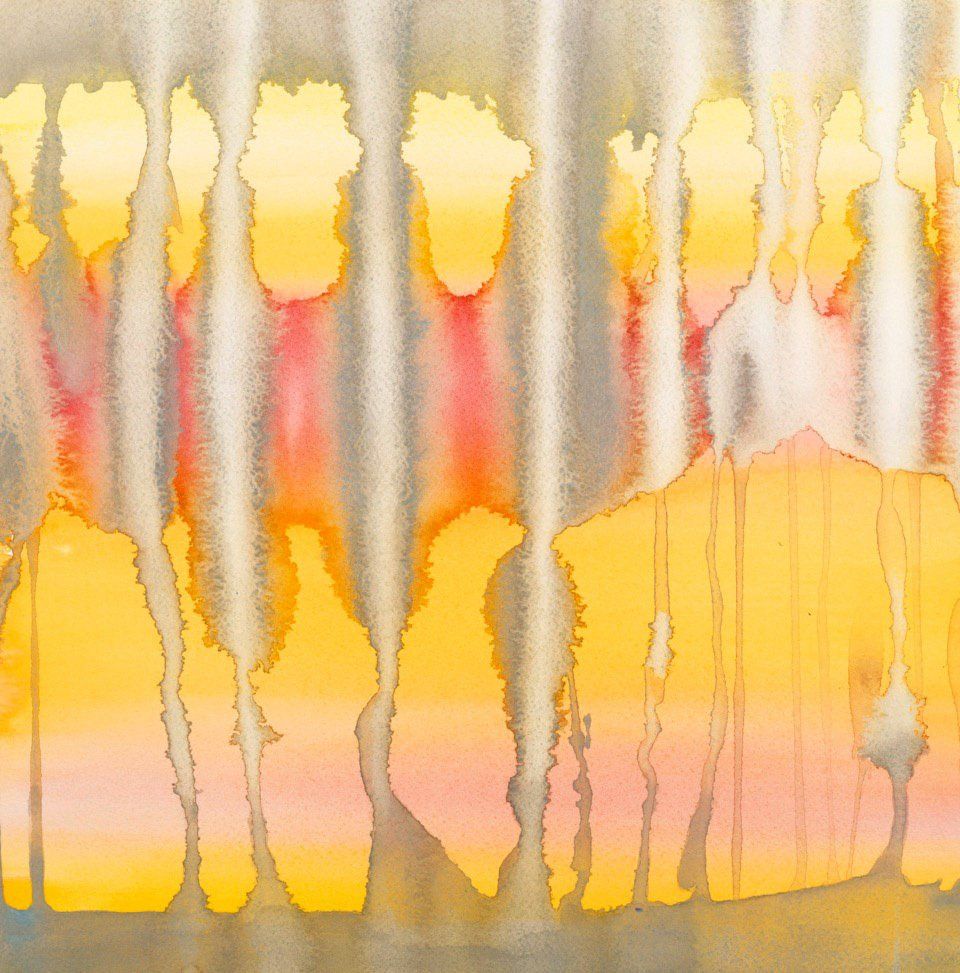 A close up of a watercolor painting of a sunset