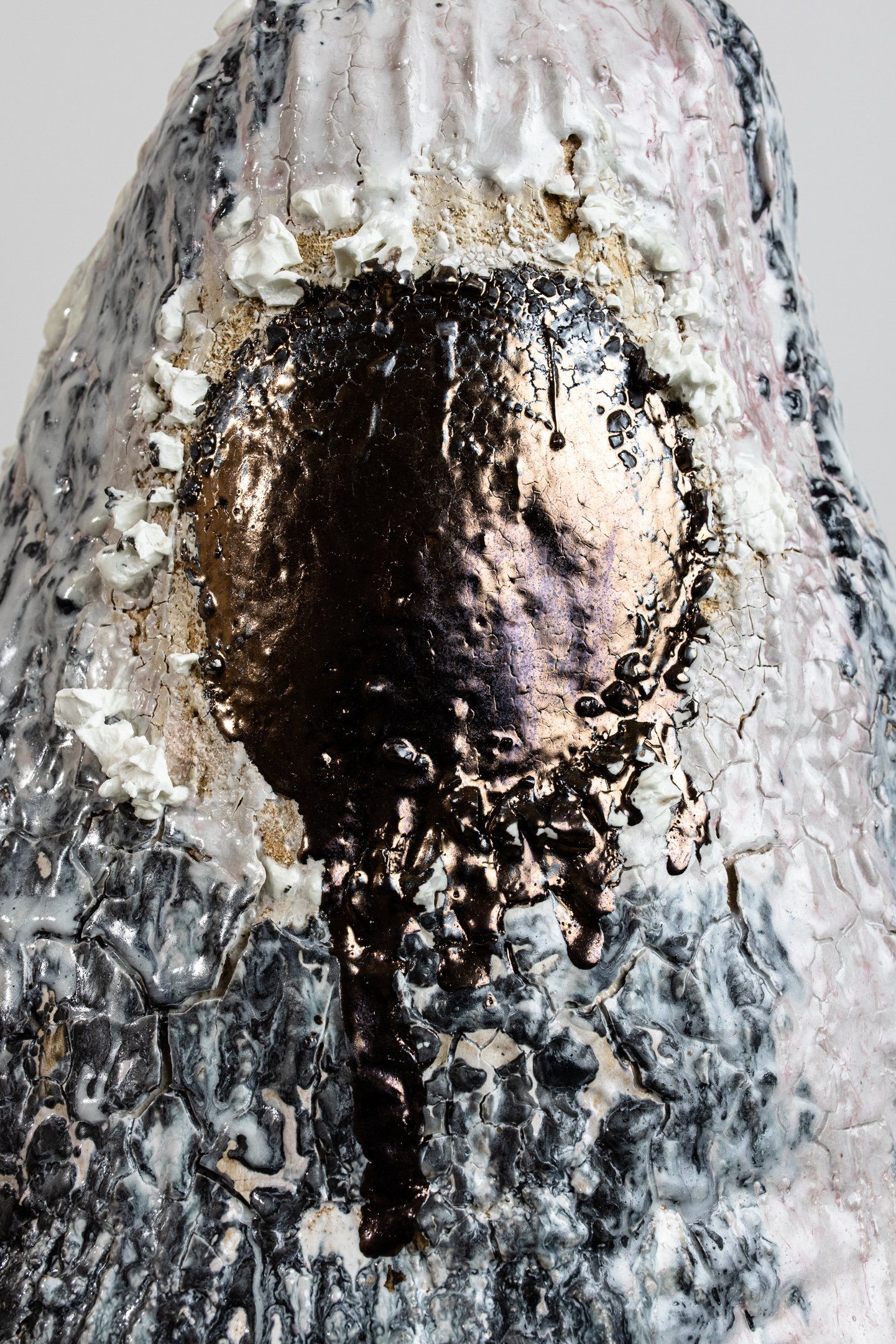 A close up of a statue of a bird with a hole in its head.