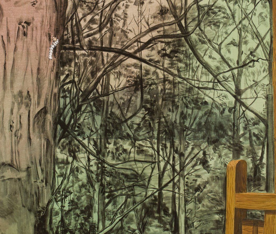 A painting of trees is hanging on a wall next to a wooden easel.