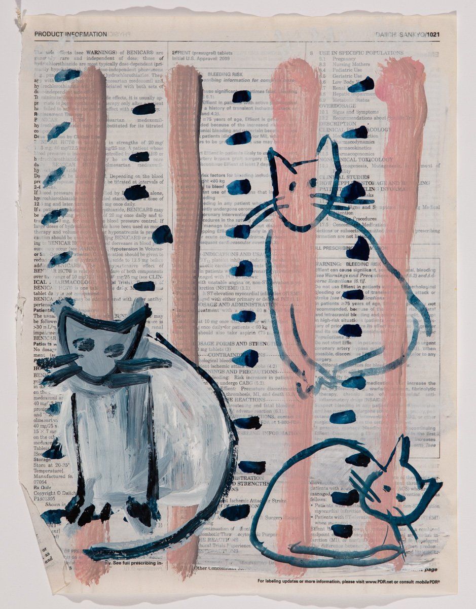 A painting of three cats on a dictionary page