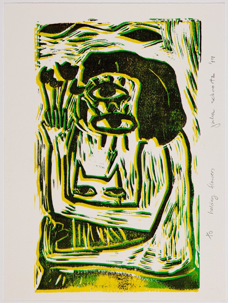 A green and yellow painting of a person 's face