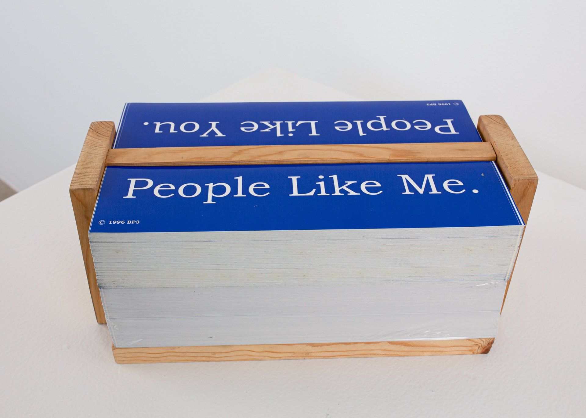 A stack of cards that say people like me