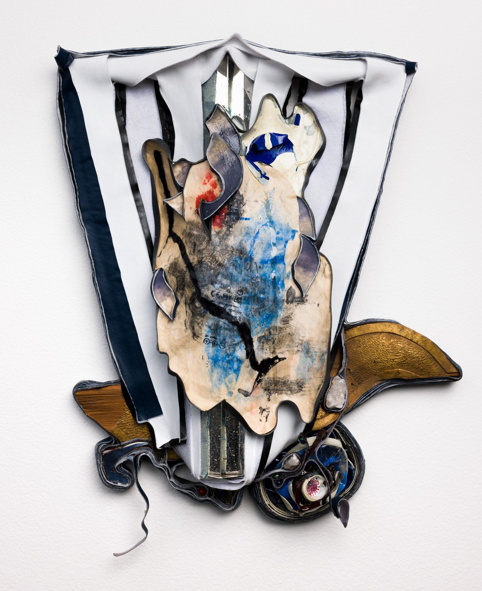 A piece of art that looks like a shield with a bird on it