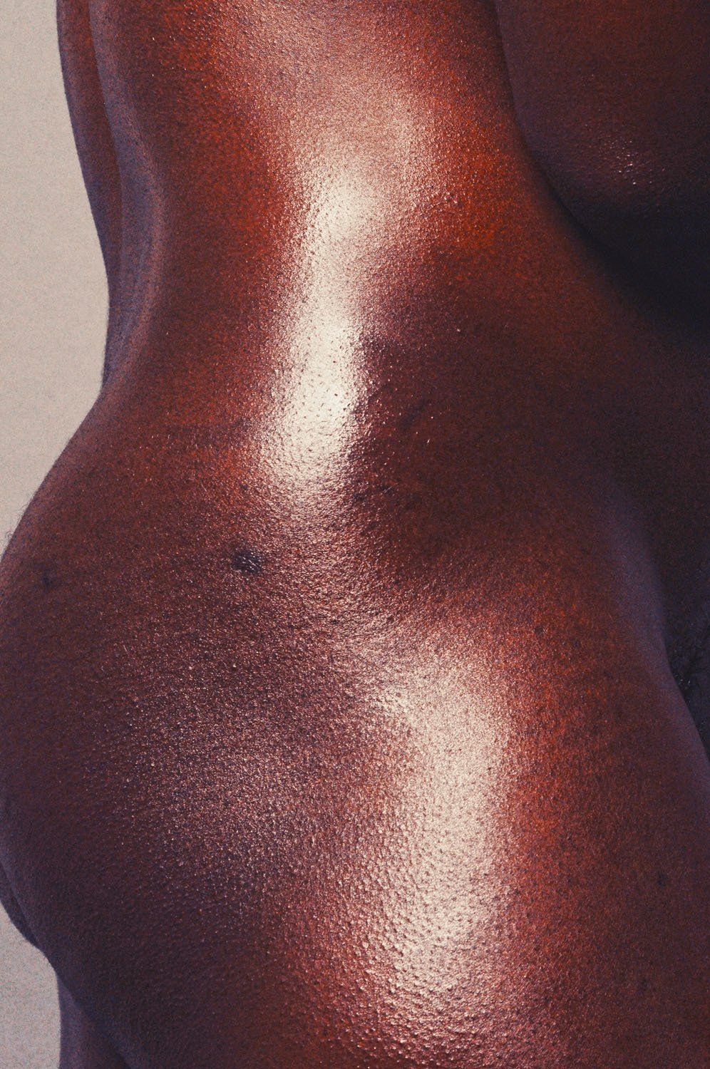 A close up of a person 's skin with a shiny texture