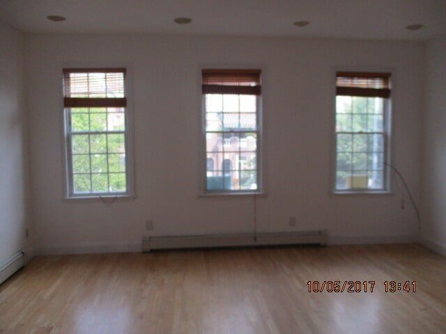Empty apartment with 3 windows — Real Estate Agent in Forest Hills, NY