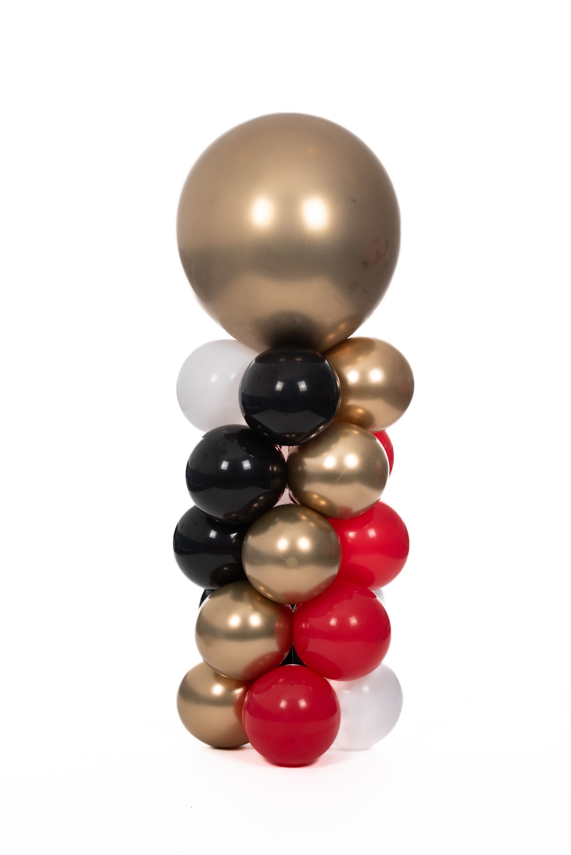 A bunch of balloons are stacked on top of each other on a white background.
