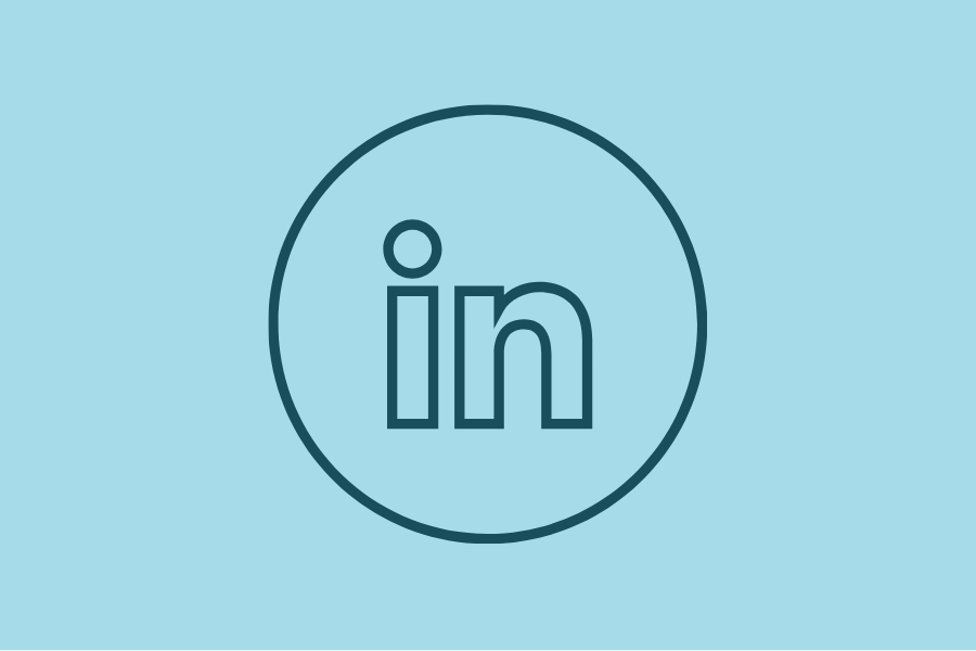LinkedIn logo in a blue circle on a light blue background
