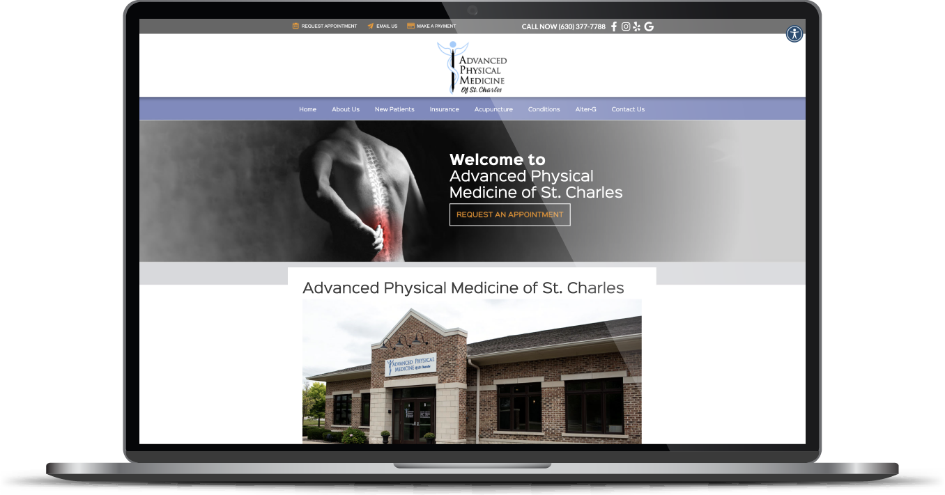 Laptop displaying a church website with a building photo and blue navigation bar
