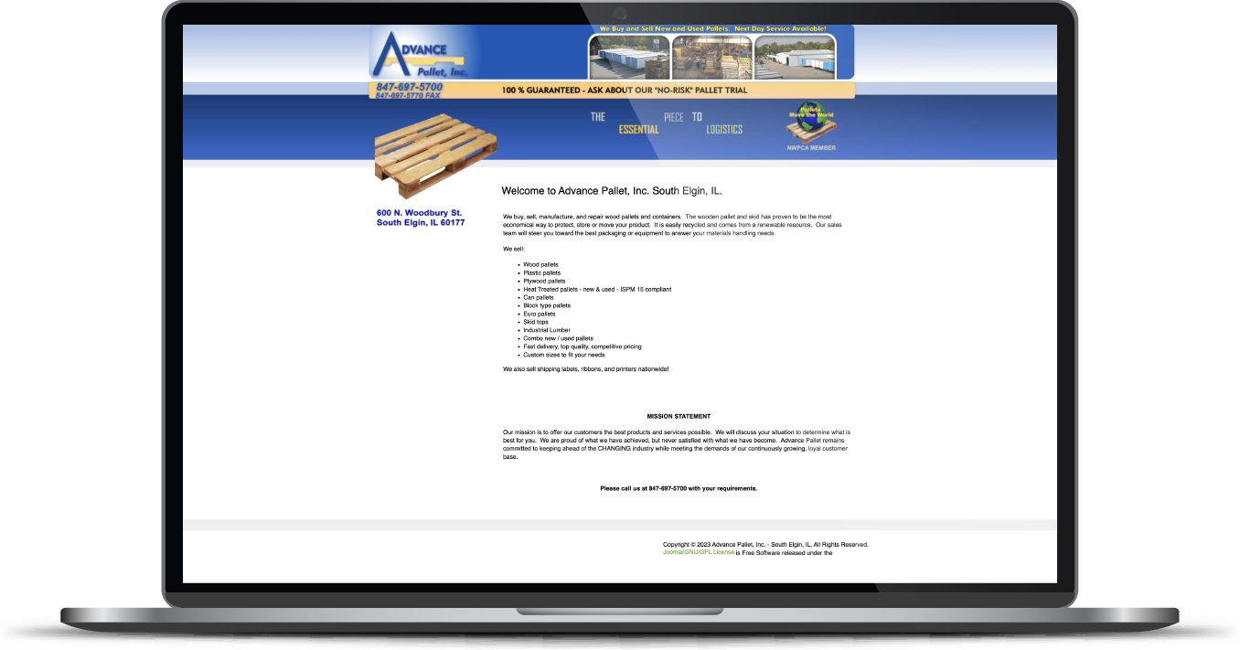 Laptop displaying a website with a blue header, white page, and small text centered on screen