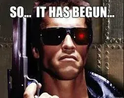 Man in black sunglasses holding a gun, with caption: “SO... IT HAS BEGUN...”