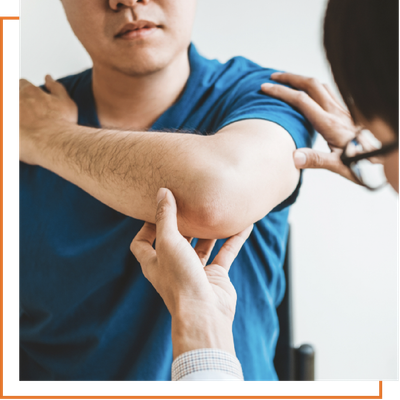 Medical professional checking a man's upper arm with a blood pressure cuff