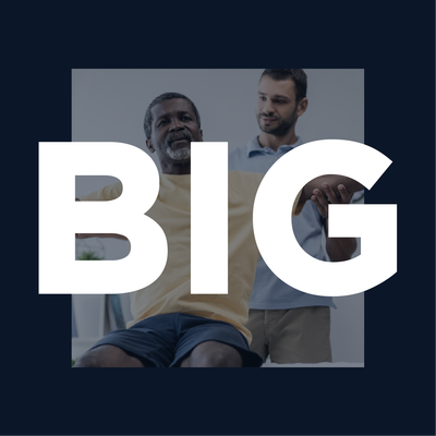 Large white “BIG” text over a photo of two people sitting in a clinical setting