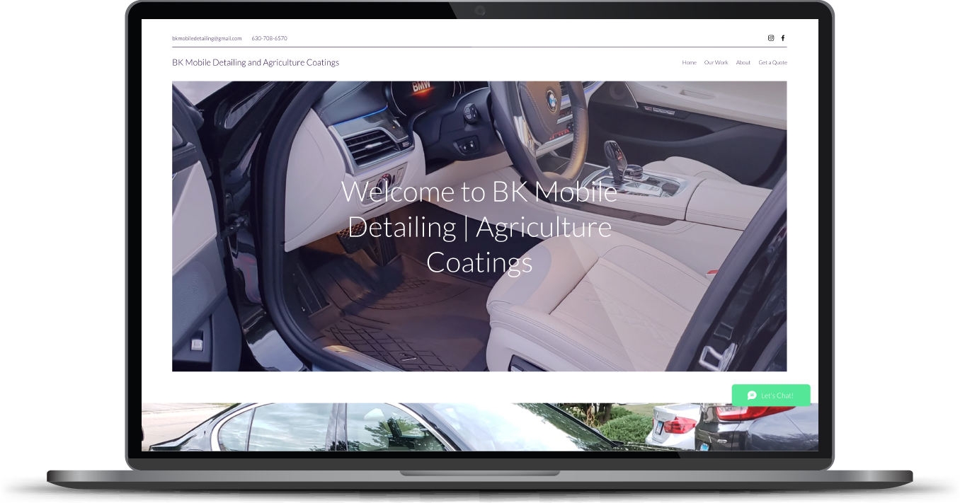 Laptop displaying a car rental website with a vehicle interior photo and search bar