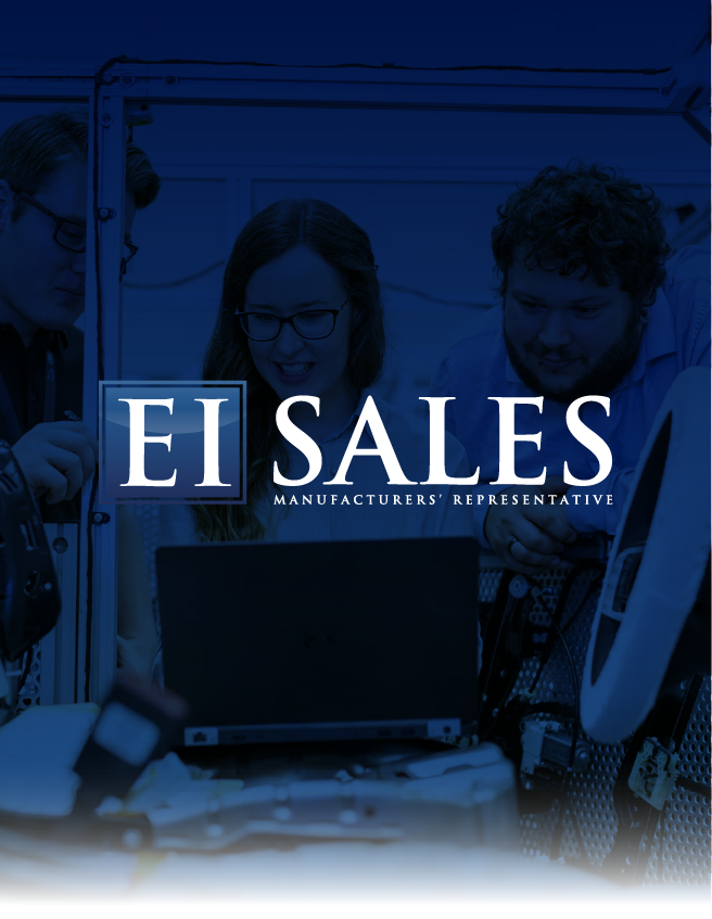 Blue-tinted sales team working around a laptop with “EI SALES” text overlay