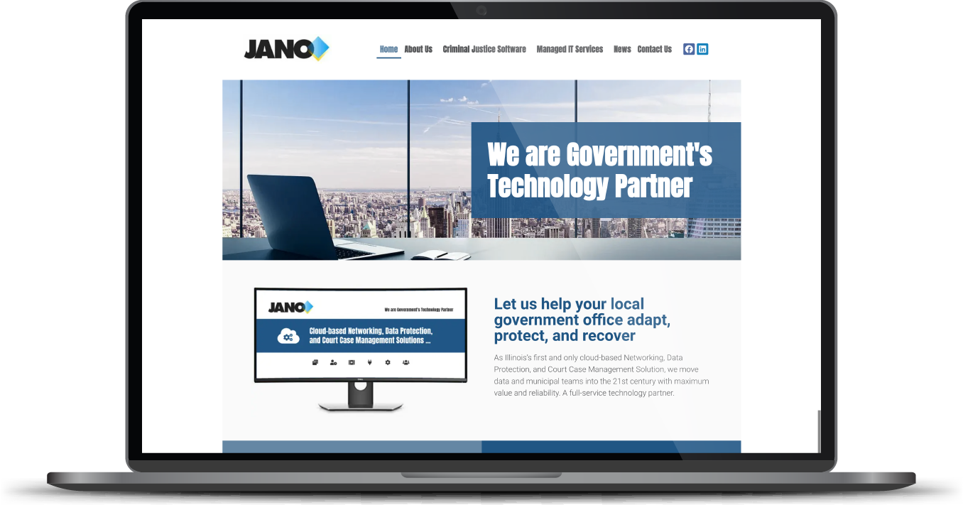 Laptop displaying a Jano website homepage with a blue banner and government technology messaging