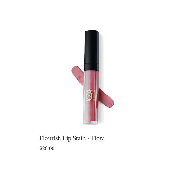 Pink lip stain tube with black cap, labeled 