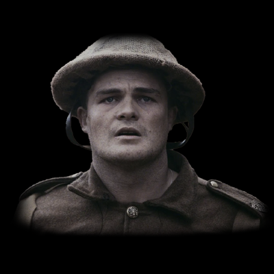 Portrait of a soldier in a brimmed hat, looking forward against a black background