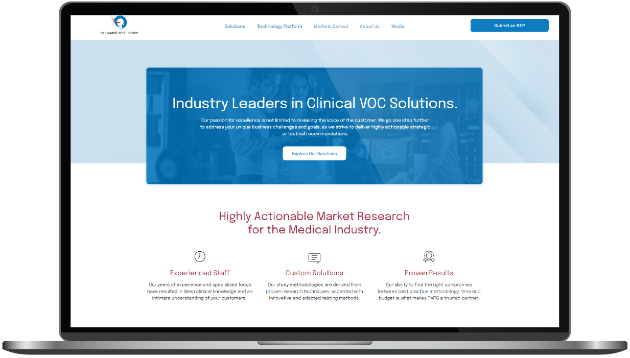 Laptop displaying a blue-and-white medical website homepage with a large banner and central buttons