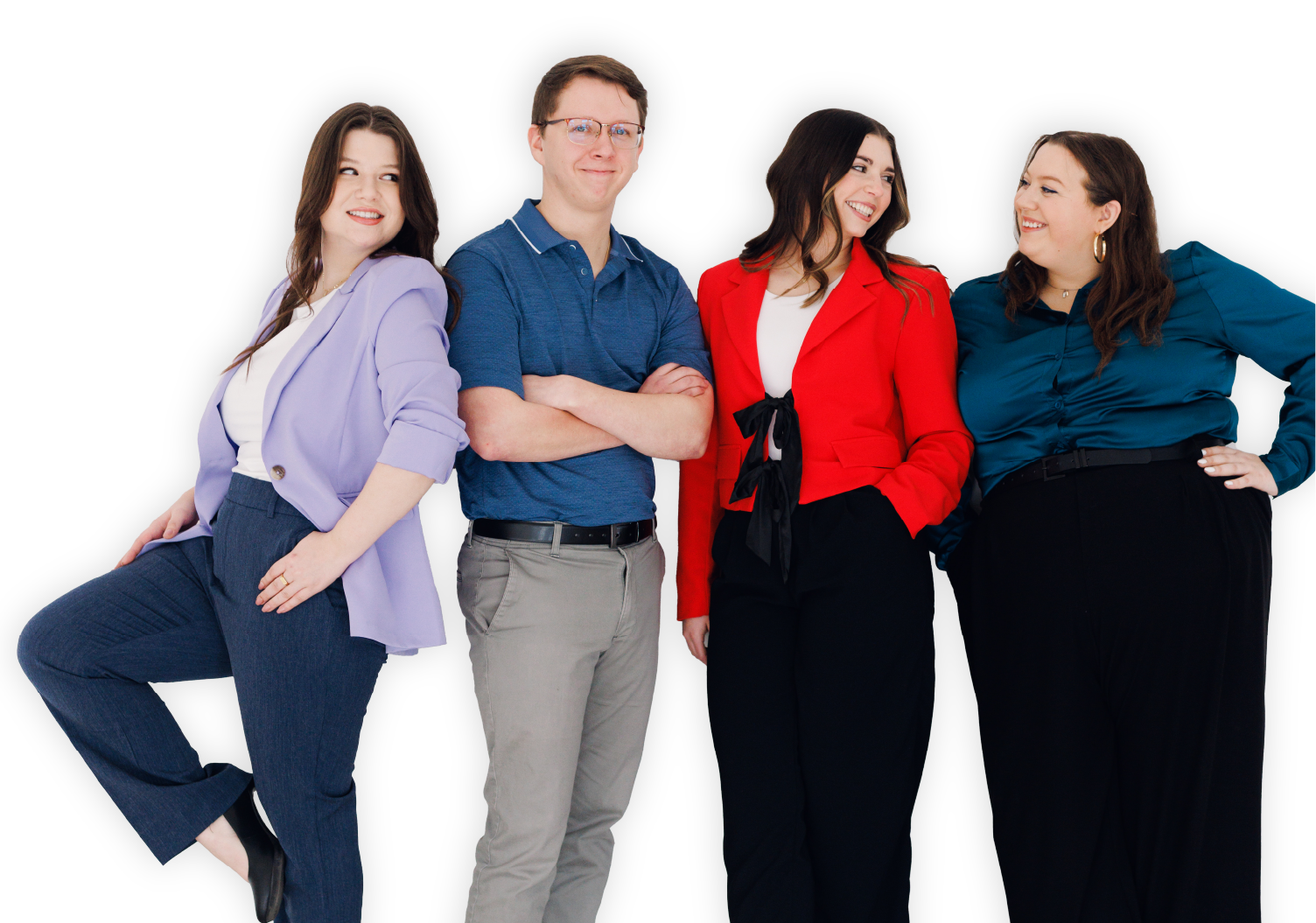 Four coworkers posing against a white background, wearing colorful business attire.