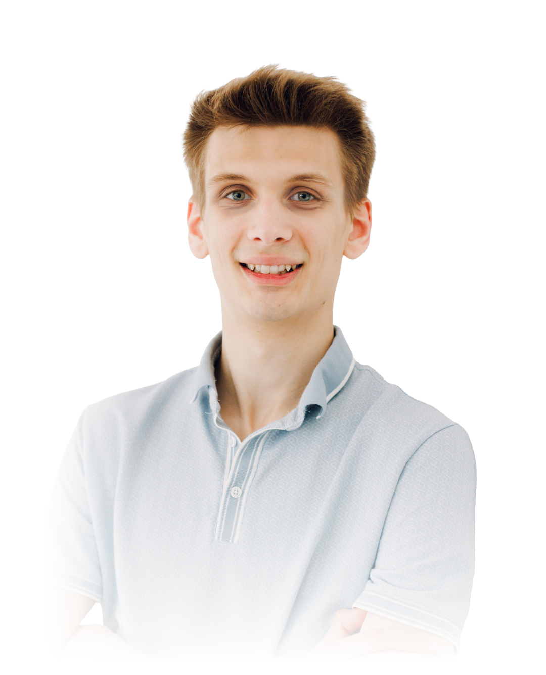 Smiling person in a light blue collared shirt against a white background