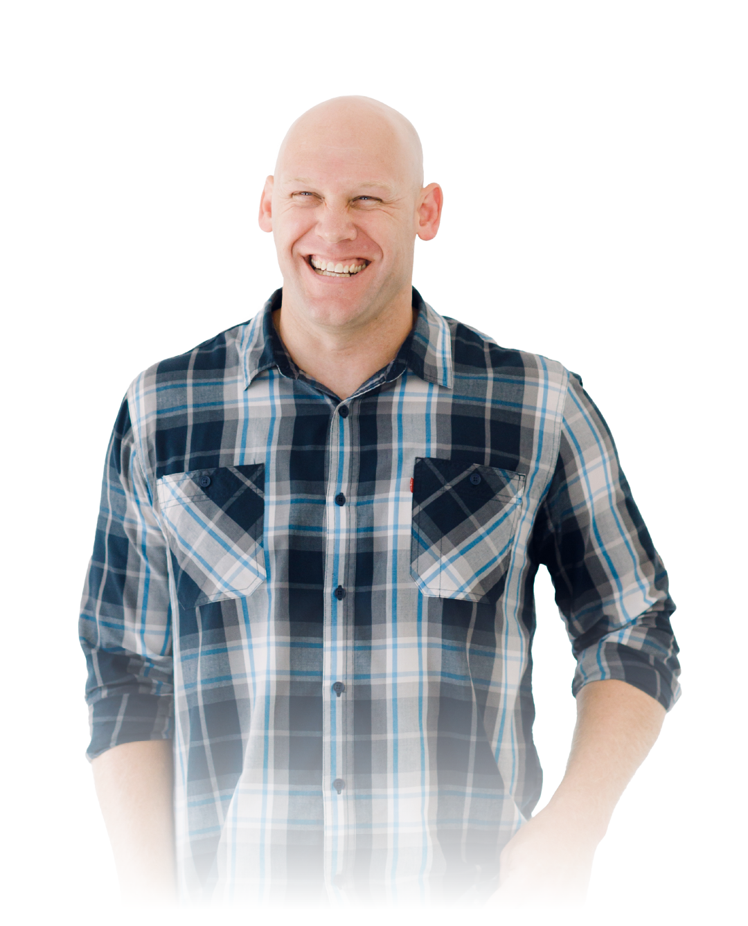 Smiling bald man in a blue plaid shirt against a white background